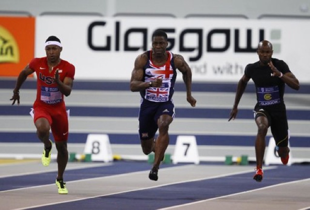 PM Douglas congratulates Kim Collins and Antoine Adams