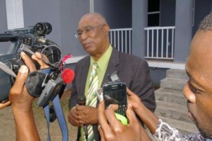 Former Premier, Hon. Joseph Parry with local media. 