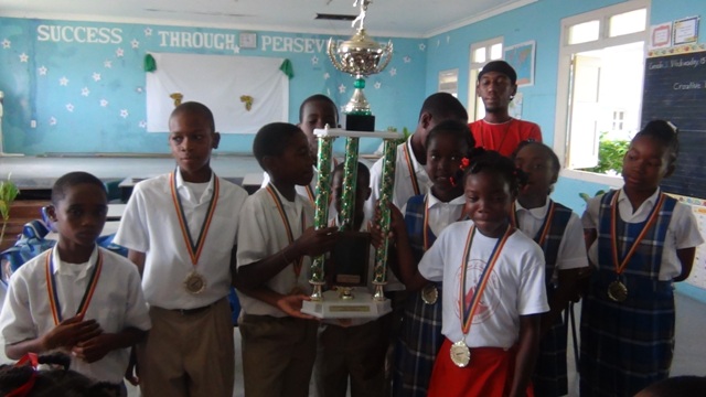 St. James’ Primary Receives Grand Trophy and Cheque