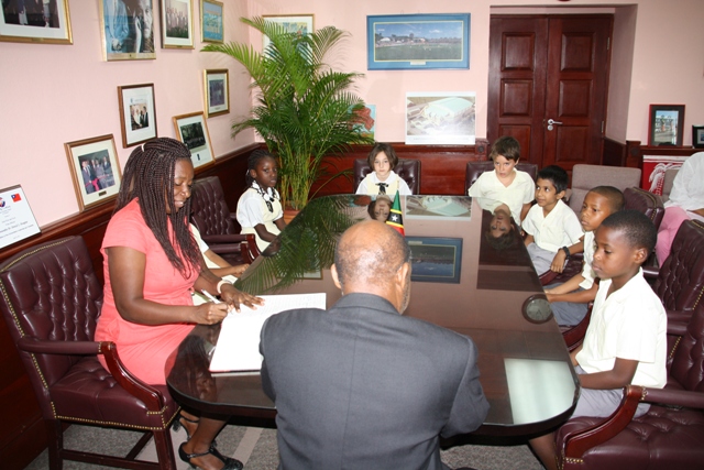 Grade Two students of Lyn Jeffers School on Nevis visit PM Douglas