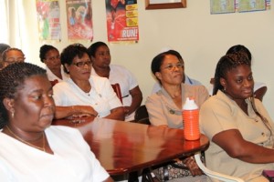 Nurses listen attentively to Deputy Premier and Minister of Health in the Nevis Island Administration Hon. Mark Brantley at the Alexandra Hospital’s conference room