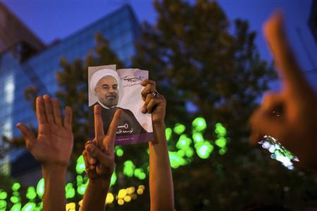 Iranians revel as new president hails Victory of moderation