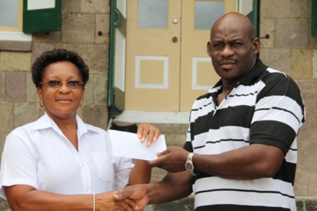 Retired educator receives donation from Nevis Renal Society