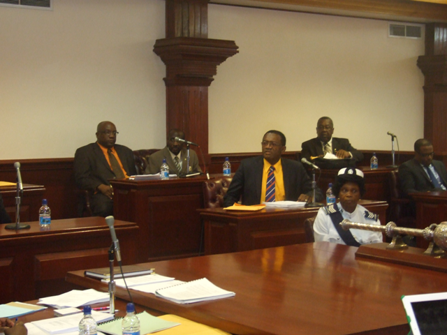 Dr. Timothy Harris is confused, says he did  not cross the floor to sit on the opposition benches