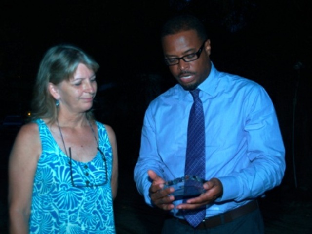 Nevis Tourism Minister commends long time resident for contribution to island’s tourism