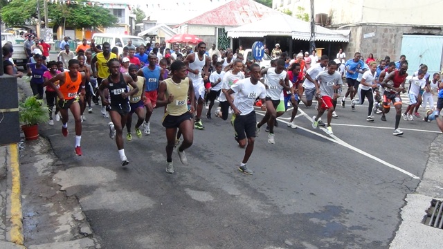 Timoy Henry of St.Kitts Takes Winner’s Cheque and Trophy in Independence 10 k Run
