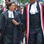 Chief Justice Ivor Archie (R) and Prime Minister Kamla Persad-Bissessar walking next to each other at the opening of the law term in Trinidad and Tobago on Monday. Photo: OPM