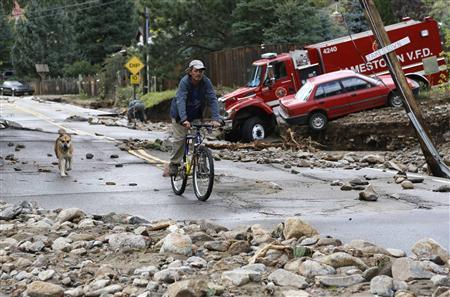 Rains pound flood-ravaged Colorado, woman may be fifth fatality
