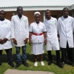 Men making a difference at the psychiatric unit pose with Staff Nurse Mrs Mfon Oyebefun (centre). They are, from left Jareem Huggins, Roland Marryshow, Javin Maynard, and George Prentice.