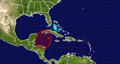 Low pressure area over northwestern Caribbean may develop into tropical cyclone