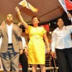 Prime Minister Kamla Persad-Bissessar flanked by Congress of the People chair Carolyn Seepersad-Bachan to her left and San Fernando Mayor Navid Muradali at a local government campaign meeting