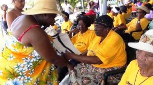 Junior Minister responsible for the care of seniors on Nevis Hon. Hazel Brandy-Williams (extreme left) interacts with seniors at a picnic at Oualie Beach (file photo) 