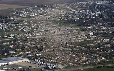 Survivors of deadly U.S. Midwest tornado sift through wreckage