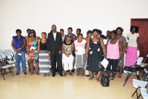  Nevisian businesswomen WISE grant beneficiaries pose for a group picture with Minister Nisbett. 