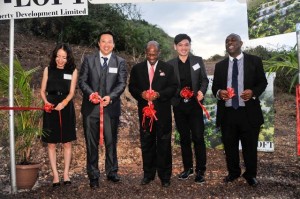  (Cutting of the ribbon) Left to right - CEO of T-Loft Property Development, Ms. Ins Zhao; T-Loft Property Development President, Mr. Tammas Tang; St. Kitts and Nevis’ Prime Minister the Right Hon. Dr. Denzil L. Douglas; Chairman of T-Loft Property Development, Mr. Leo Zeng and T-Loft Property Development attorney, Mr. Anthony Johnson