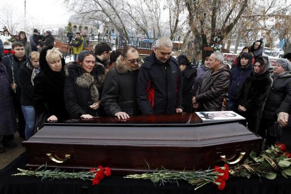 Russian police round up dozens after suicide bombings