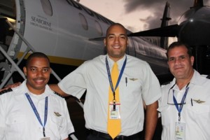 Captain and crew of the Seaborne Airlines after its inaugural flight into the Vance W. Amory International Airport on January 15, 2014. (L-R) First Officer Alex Alcantara, Flight Attendant Bruce Padilla and Captain Hugo Vissepo