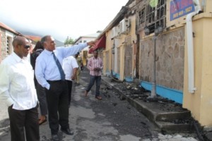  Prime Minister of St. Kitts and Nevis the Right Hon. Dr. Denzil Douglas tours the burnt Treasury Building in Charlestown with Premier of Nevis Hon. Vance Amory on January 24, 2014