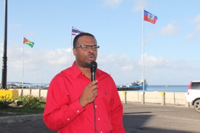 Multiple national flags hoisted on Nevis Waterfront