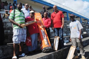  PEP workers received work tools from the Prime Minister. Picture shows from left Mr Devon Richardson, PEP Supervisor Lavington; Ms Marjorie Rawlins, PEP 