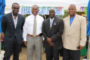 (l-r) Chairman and CEO of TEMPO Networks, LLC Frederick Morton Jr., Premier of Nevis Hon. Vance Amory, Minister of Agriculture Hon. Alexis Jeffers and Permanent Secretary in the Department of Agriculture Eric Evelyn visiting booths at the 20th Annual Agriculture Open Day