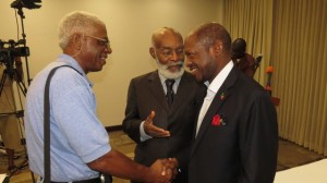 Mr. J. S. Archibald Q.C. (center) introduces long friend and prominent BVI businessman; Mr. Elihu Rhymer (left) to Prime Minister the Right Hon. Dr. Denzil L. Douglas during a Town Hall Meeting the Prime Minister hosted in Tortola on February 7th 2014.