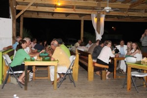  section of persons at a cocktail reception at the Lime Beach Bar and Grill at Pinneys Beach Bar and Grill at Pinneys Beach, hosted by the Nevis Tourism Authority and the Nevis Air and Sea Ports Authority