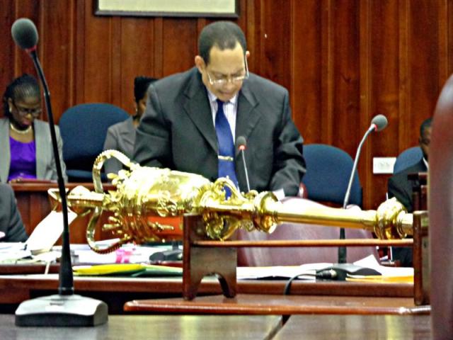 Legal Affairs Minister urges support of economic improvement initiatives