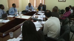 Premier of Nevis and Minister of Finance Hon Vance Amory and Acting Permanent Secretary in the Ministry of Finance Mr. Colin Dore (head table) meet with International Monetary Fund delegation at the Ministry of Finance conference room on May 13, 2014