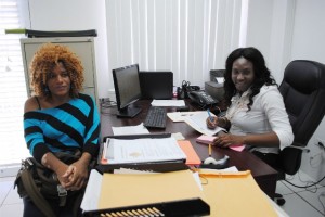 A woman of her word: Ms Altagracia at the PEP office in Dorset with WISE Officer, Ms Kadijah Harris.