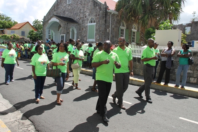 NIA shows support for island’s youth, joins Child Month Parade through Charlestown
