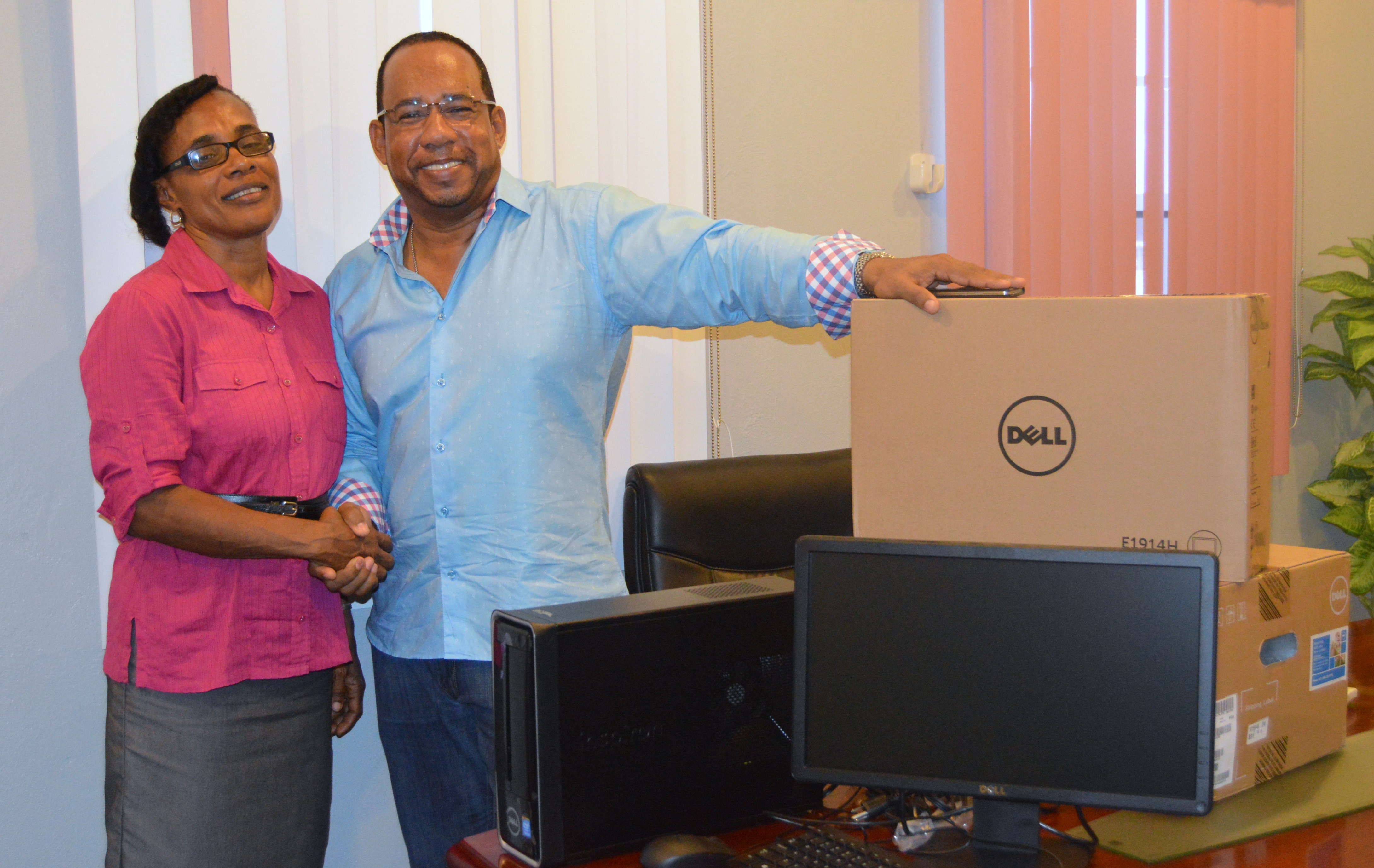 Attorney and businessman, Gregory Hardtman donates two Computers to the Gingerland Secondary School