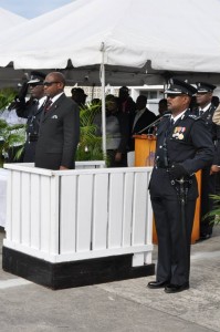 Prime Minister the Right Honourable Dr. Denzil Douglas flanked by Commissioner of Police Celvin G. Walwyn (left) and Assistant Commissioner of Police Ian Queeley