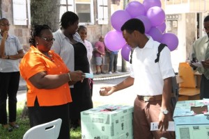 Director of the Department of Statistics and Economic Planning Doriel-Tross Phillip with a student of the Nevis Sixth Form College, at the Careers in Statistics Awareness and Education Fair at the Memorial Square in Charlestown on October 15, 2014