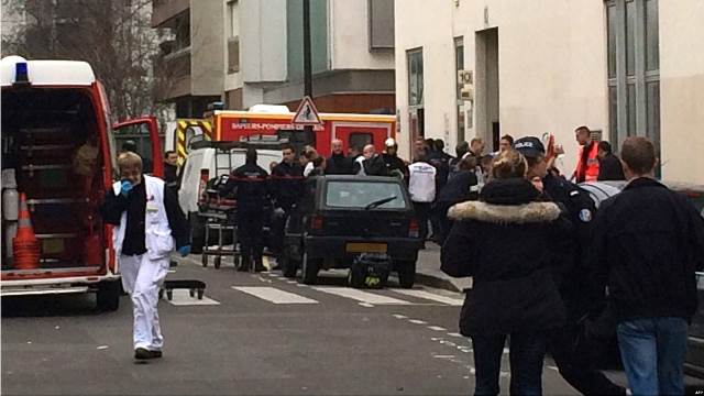 Charlie Hebdo: Gun attack on French magazine kills 12