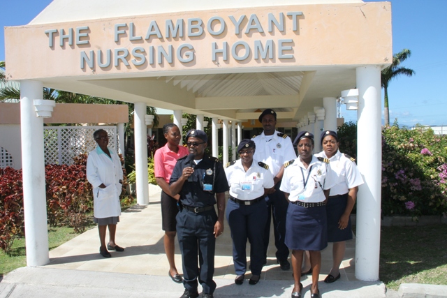 Nevis Custom Officers visit elderly at Flamboyant Nursing Home