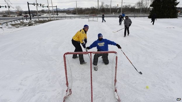 Record-breaking cold descends on eastern US
