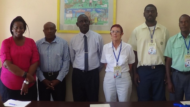 Taxi Drivers Receive Badges and Certificates