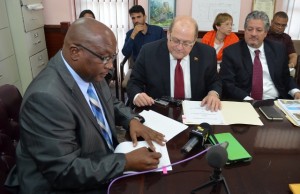 PM Harris signs sugar workers compensation upgrade agreement