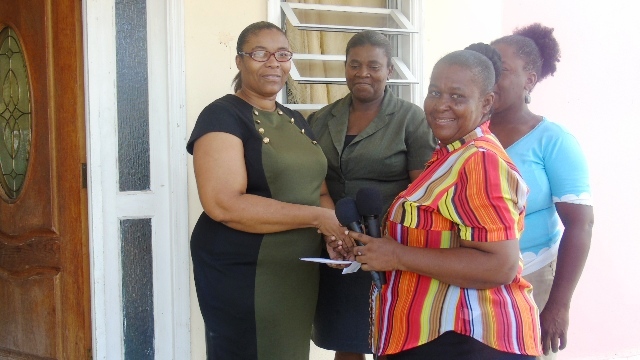 Single Parents’ Group Donates to Raymond’s Cause