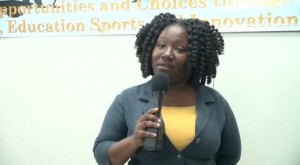 Youth Officer Lanisa Burke during the prize giving ceremony at the Department of Youths and Sports conference room in Charlestown on July 28, 2015
