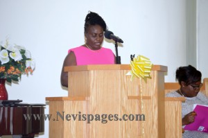 Principal, Ms. Cherry-Anne Walwyn delivering the school's report