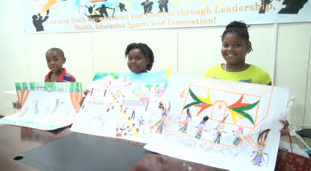 Budding winning artists receive prizes from Dept. of Youth and Sport’s art contest