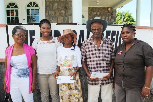 SWRF delivers gratuity cheques to senior Nevisian ex-sugar workers