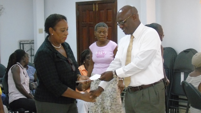 SENIORS’ FEATURE IN CRAFT DISPLAY AND SALE AND RECEIVE CHEQUE FROM NCCU