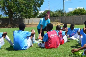 The coaches from Manchester City FC sharing valuable insights with the Anguilla boys on how to improve their game at the Digicel Kickstart Clinic