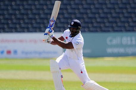 Hughes strokes half-century for Derby