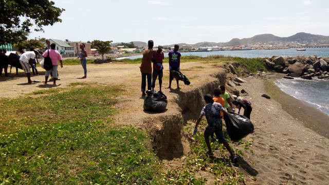 YOUTH DEPARTMENT STAFF AND VOLUNTEERS CLEAN UP BAY FRONT