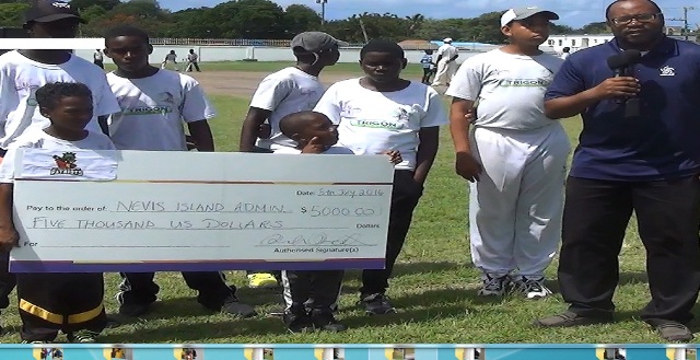 Director Of Sports Accepts Cheque From SKN Patriots