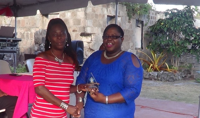 ANGELA CHALLENGER-WORKER OF THE YEAR